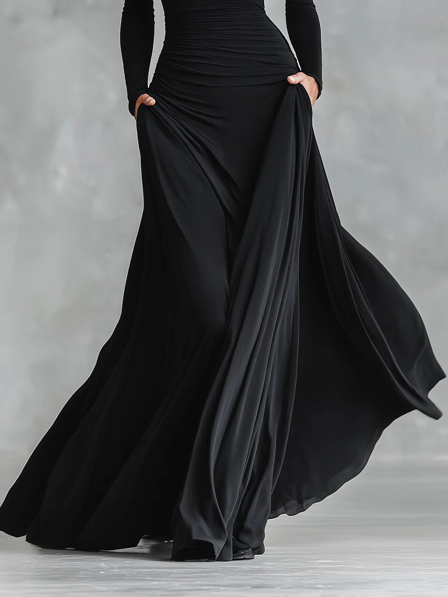 Irene | Modern long dress in black crepe with boat neckline and pleats