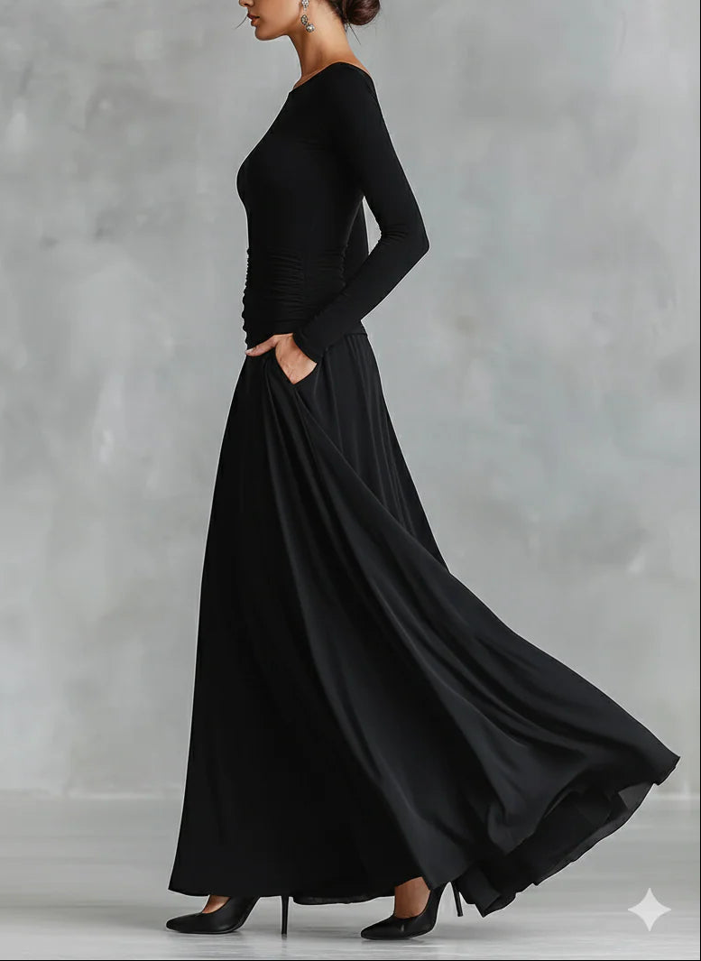 Irene | Modern long dress in black crepe with boat neckline and pleats